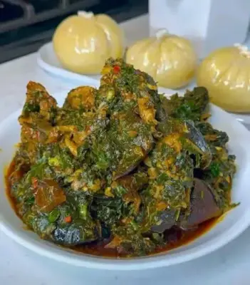Afang soup and fufu/eba/pounded yam from The Peppersoup Alchemist